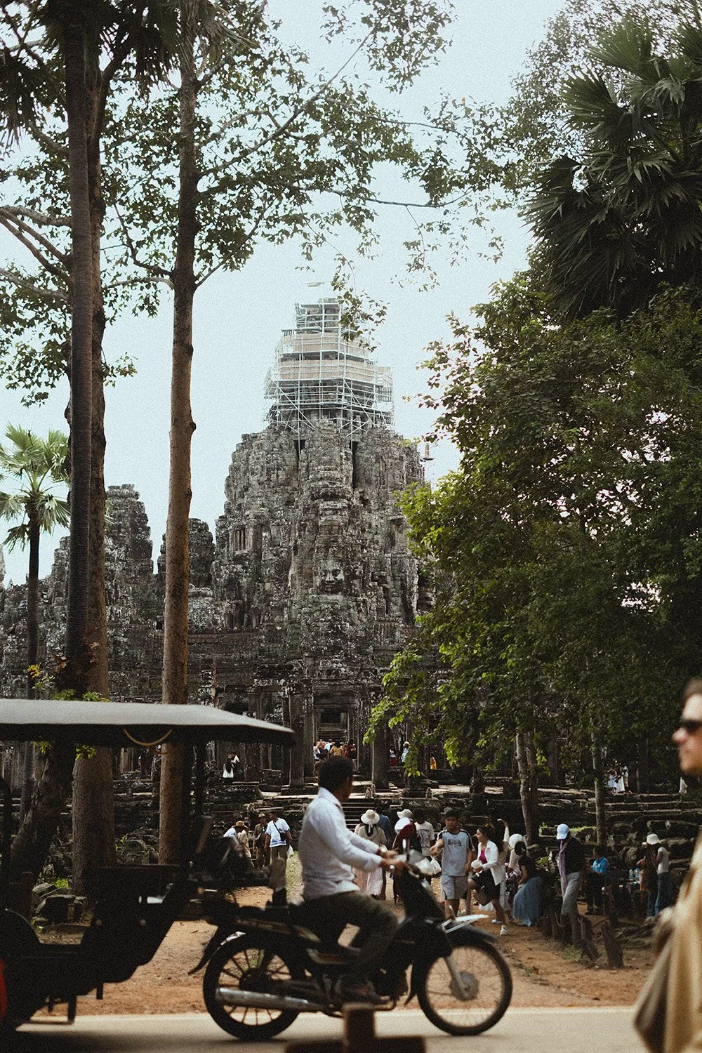 Angkor Wat grounds — towers, galleries, tourist crowds, hidden corners