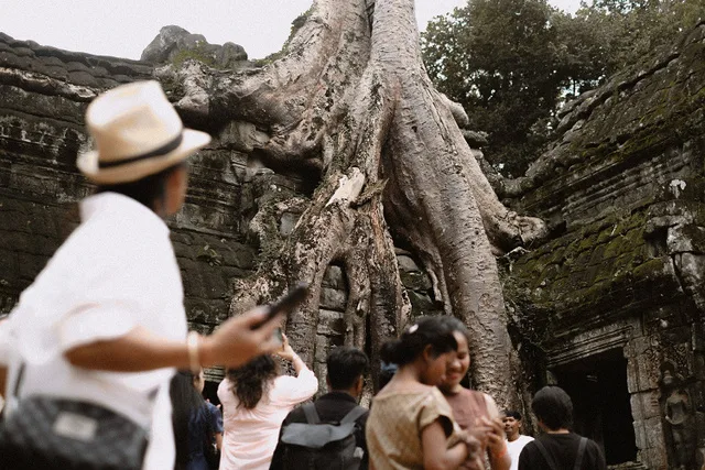 Angkor Wat grounds — towers, galleries, tourist crowds, hidden corners