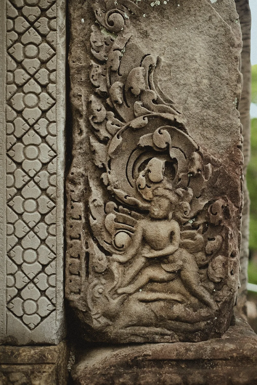 Angkor in close-up — textures, moss, ancient carvings